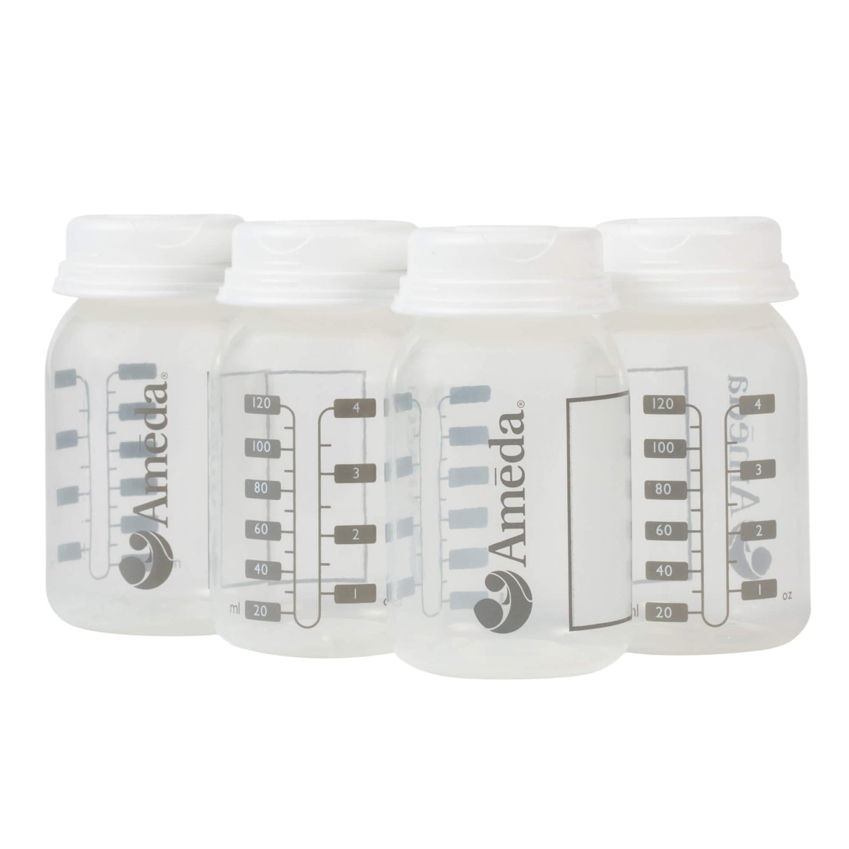 Four clear baby bottles with measurement markings and white lids, arranged in a row.