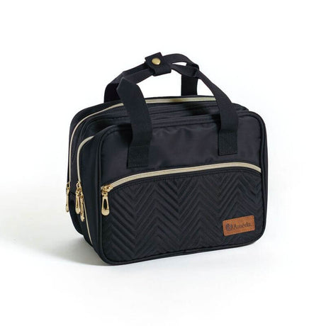 A carrying case for portable Ameda breast pumps about the size of a purse.