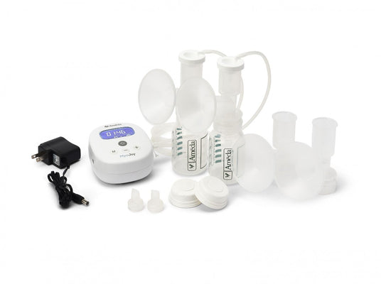 A collection of breast pump parts is displayed on a white background. The set includes a small white pump unit with a digital timer and control buttons, a black power adapter with a cord, and several clear plastic bottles with white flanges and lids. Two of the bottles feature measurement markings along the side. Additional white accessories, including bottle caps and connectors, are also present in the arrangement.