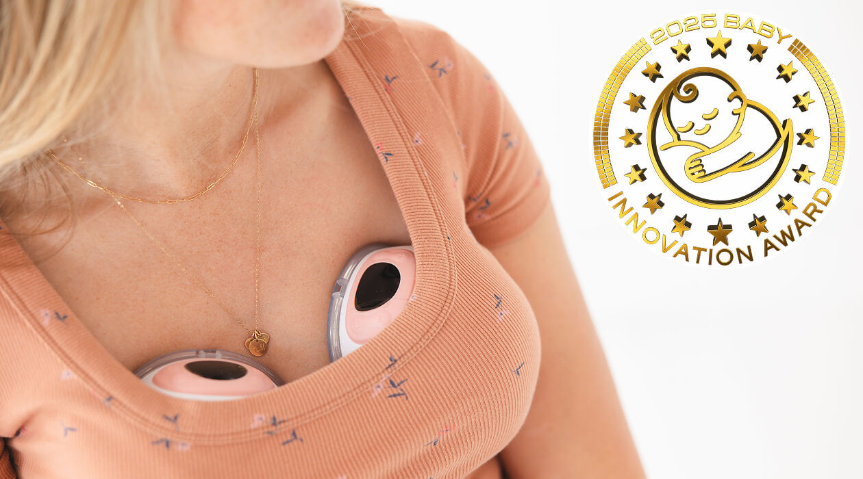 Woman wearing a wearable breast pump with 2025 Baby Innovation Award logo featured.