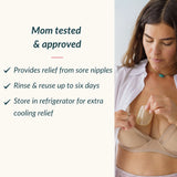 Breastfeeding mother placing an Ameda ComfortGel HydroGel Pad inside her nursing bra for soothing nipple relief