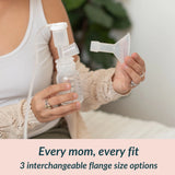 Mother holding an Ameda CustomFit 2-piece flange and breast pump kit, showing the 3 interchangeable flange size options — 17mm, 19mm, and 21mm