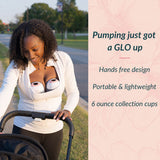 Woman smiling while pushing a stroller, wearing a hands-free breast pump under her jacket; text on the side highlights the pump's features: hands-free design, portable and lightweight, with 6-ounce collection cups.