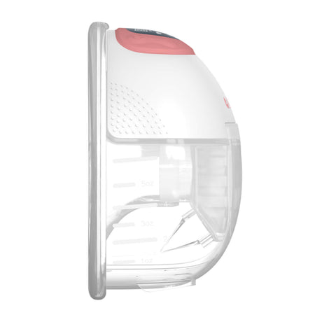 Side view of an Ameda wearable breast pump showing a white and pink top section with digital display, and a transparent lower section marked with ounce measurements for milk collection.