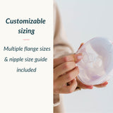 A person holding a breast pump flange next to text reading "Customizable sizing. Multiple flange sizes & nipple size guide included."