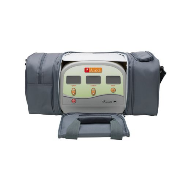 A gray carrying bag is partially unzipped, revealing a device inside. The device has a rounded, white and green front panel featuring three buttons labeled "speed," "suction," and "time." There is a red power button below these controls. The bag is designed with a sturdy handle on the front and a side pocket, indicating it is meant for travel or portability.