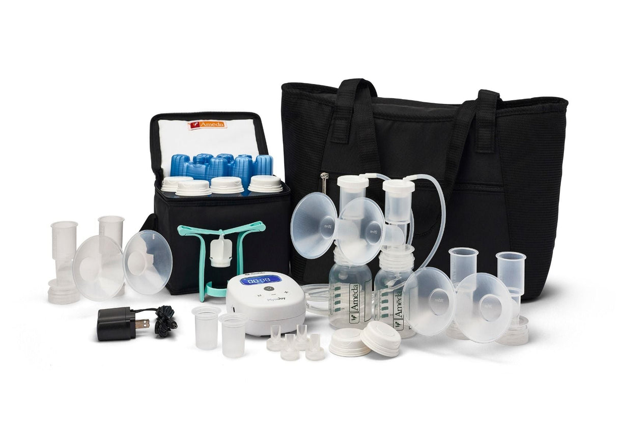 A collection of breastfeeding pump accessories is displayed on a white background. The items include a white breast pump device with a digital timer on its side, several transparent bottles with white lids, and various size breast shields in different stages of assembly. There are also blue caps, white connectors, and a charger with a cord. All of these components are organized beside a black carrying bag that is partially open, revealing additional storage for the items.